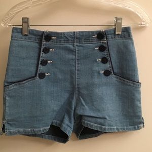 Tailored high-waisted shorts with button detailing